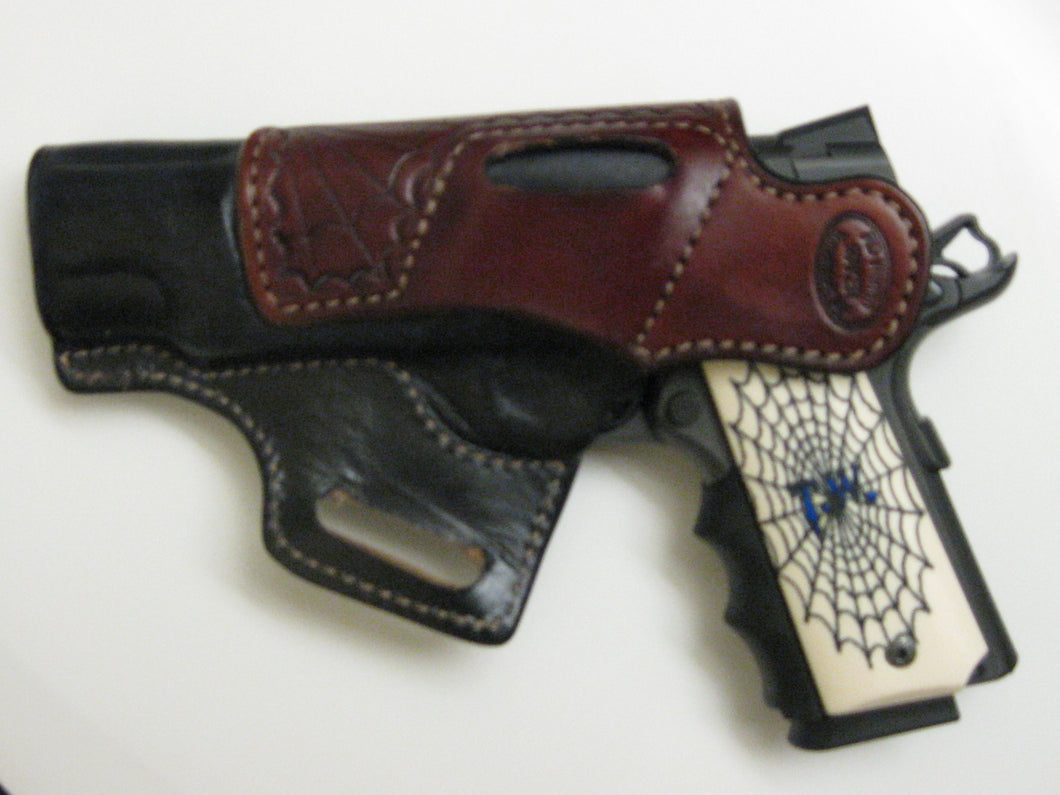 Holster for Tommy Web only. Black and saddle tan with web art.